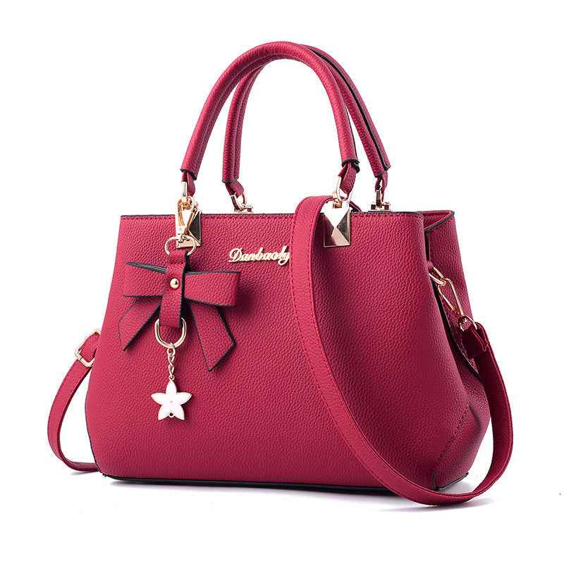 Women's PU Leather Crossbody Bag with Bow Pendant - Fashionable Small Satchel