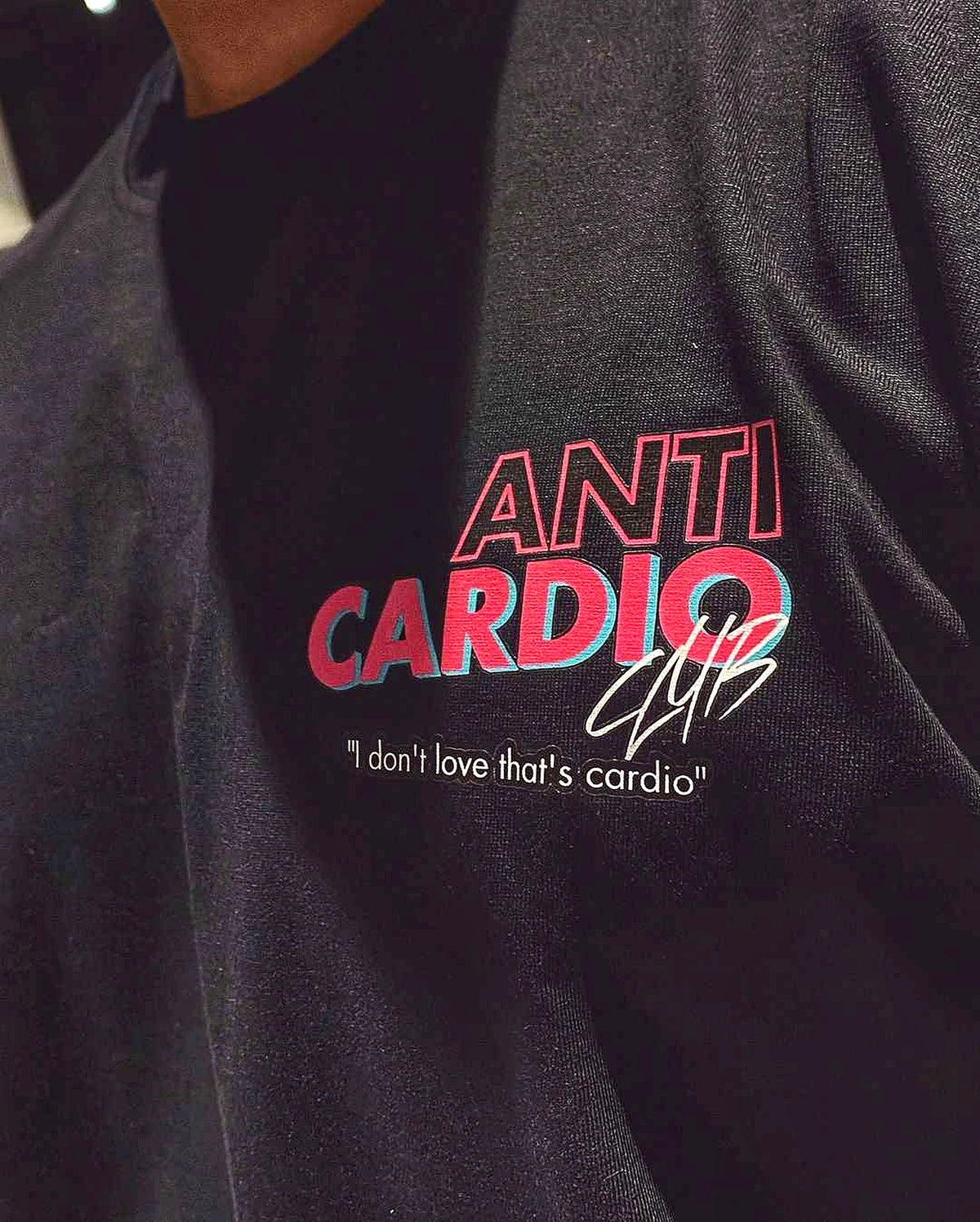 Close-up of original Anti Cardio back print on black shirt