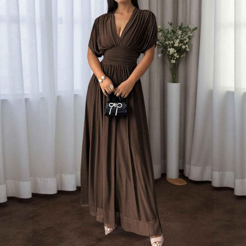 Long Flared Dress With Pleats At The Waist